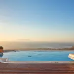 Kamini Santorini *